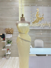 Custom-made party dress designed to flatter your figure.